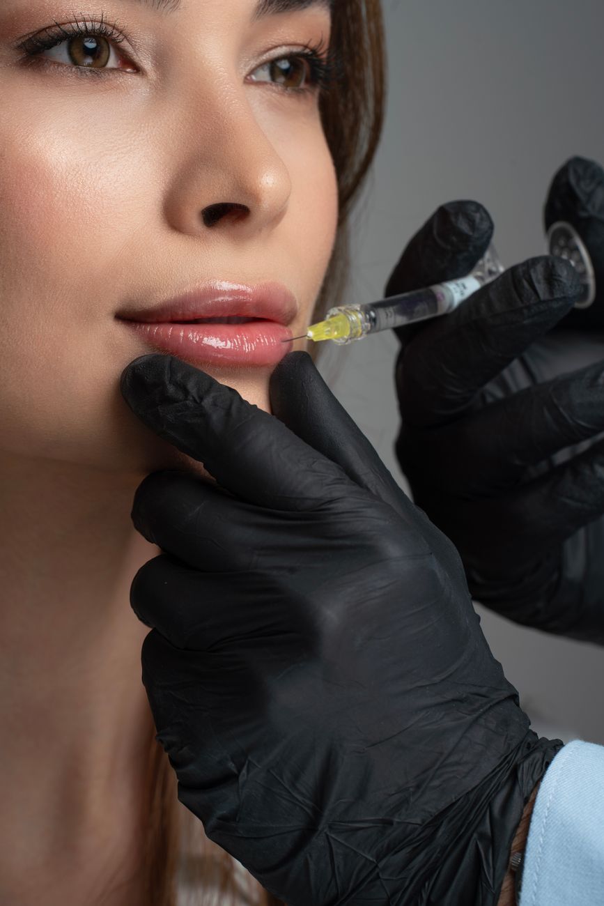 close up of cosmetic lip injection procedure